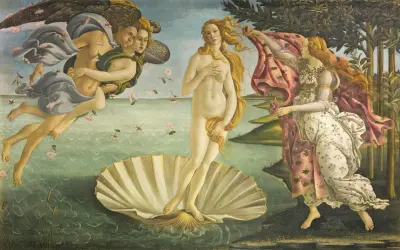 La Nascita di Venere agli Uffizi: Venere su una conchiglia, spinta da Zefiro e Aura, accolta da una ninfa.
