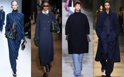 Modelli in passerella mostrano come abbinare il blu scuro: con stampe floreali, jeans, perle e tessuti sartoriali.