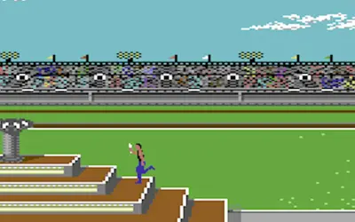 Biegacz na schodach stadionu, klasyczne gry na Commodore 64. Widownia kibicuje.