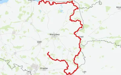 Mapa Polski z zaznaczoną na czerwono najdłuższą ścieżką rowerową w Polsce, biegnącą od wybrzeża Bałtyku przez Warszawę aż po okolice Krakowa.
