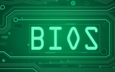 Zielony schemat obwodu drukowanego z napisem BIOS. Dowiedz się, jak zaktualizować BIOS, aby poprawić wydajność komputera.