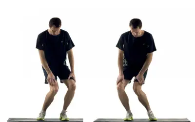 Homme effectuant un exercice de renforcement du genou, en position accroupie avec les mains sur les genoux.