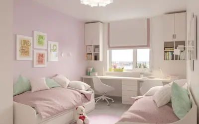 Chambre rose et blanche avec deux lits jumeaux, un bureau et des étagères, idéale pour séparer une chambre en deux.