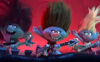 Trzy trolle rockmani grają na gitarach, tworząc energetyczne trolle piosenki.