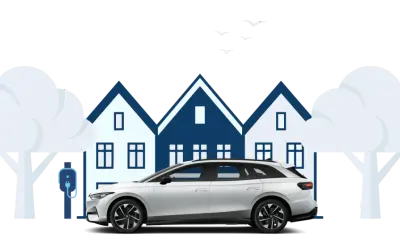 En vit elbil laddas vid ett hus. Tänk på vad som ingår i leasing av bil för en bekymmersfri vardag.