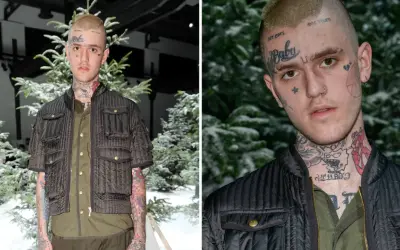 Lil Peep, med tatueringar och klädd i en mörk jacka, står framför snötäckta träd. Hans ansikte bär texten "Baby". Frågan "hur dog Lil Peep" ekar i minnet.