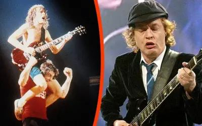AC/DC na żywo: jeden z członków zespołu gra na gitarze, siedząc na ramionach drugiego. Obok, Angus Young w czapce i marynarce, grając na gitarze. To są ich największe przeboje.