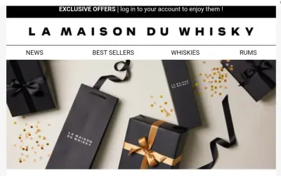 Eleganckie czarne opakowania z logo "La Maison du Whisky" i złotymi wstążkami, otoczone konfetti. Idealne na prezent dla miłośnika whisky.