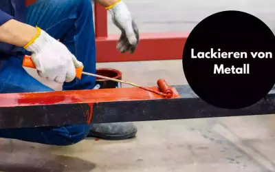 Person lackiert mit Farbrolle ein Metallprofil rot.