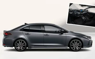 Nowoczesna Toyota Corolla 2026 w szarym kolorze, z widokiem na eleganckie wnętrze.
