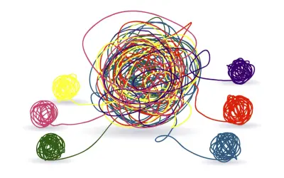 Un groviglio di fili colorati rappresenta la complessità della mente. Chi va dallo psicologo cerca di districare i propri pensieri, uno alla volta, per ritrovare serenità.
