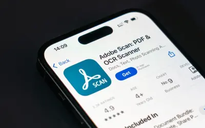 Ekran telefonu z aplikacją Adobe Scan, świetnym programem do skanowania dokumentów i tekstu.