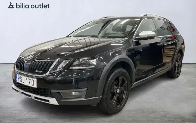 Svart Skoda Octavia Scout, registreringsskylt PSJ 170. En bil som kan ha ett problem, men ser fin ut.