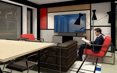 Man i kostym läser i en röd stol i ett rum med bauhaus inredningsstil. Mörkt lädersoffa, stort bord och tv.
