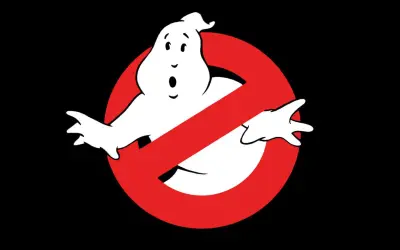 The iconic Ghostbusters logo featuring a white, surprised-looking ghost behind a red prohibition sign.
