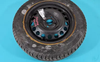Koło zapasowe do Opel Astra G, z widocznym rozstawem śrub. Opona Continental 185/65 R15.