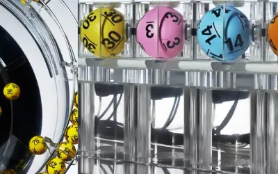 Kulki do lotto w maszynie losującej. Zastanawiasz się, gdzie leci lotto? Oto liczby: 16, 29, 30, 31, 46, 76.