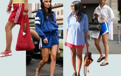 Four women showcase their sporty style in Adidas shorts and athletic-inspired outfits, blending comfort with fashion.