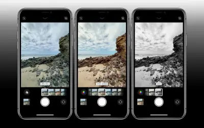 Zobacz, jak włączyć filtry w iPhone, porównując oryginalne zdjęcie z wersjami "Vivid Warm" i "Noir". Wybierz najlepszy efekt dla swojej fotografii.