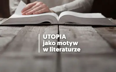 Otwarta księga na drewnianym stole, symbolizująca utopijny i realny obraz rzeczywistości w literaturze.