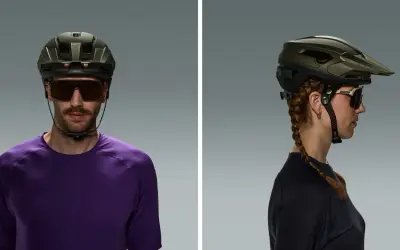 Unterschied Fahrradhelm, Skaterhelm: Mann und Frau tragen unterschiedliche Helme, beide mit Sonnenbrille.
