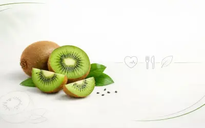 Całe i pokrojone kiwi z liśćmi, symbolizujące, czy kiwi jest zdrowe. Obok ikony serca, sztućców i liścia.