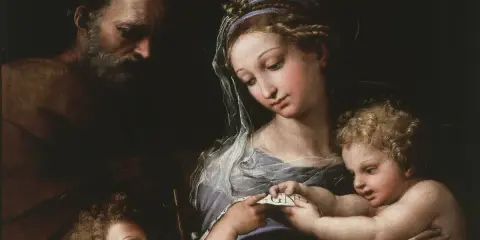 La Vierge à l'Enfant de Raphaël, avec Saint Joseph en arrière-plan. La Vierge lit un texte à l'Enfant Jésus.