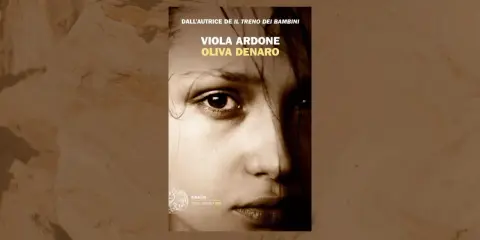Copertina del libro "Oliva Denaro" di Viola Ardone, con un primo piano intenso del volto di una ragazza.