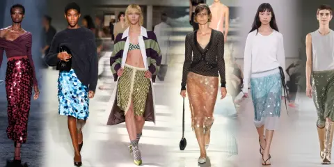 Modelli sfilano con gonne a paillettes in varie tonalità: bordeaux, blu, verdi, oro e azzurre. Ecco come abbinare gonna paillettes oro per un look scintillante.