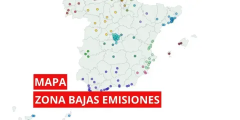 Mapa de España con puntos de colores indicando zonas de bajas emisiones. Es obligatorio llevar la pegatina medioambiental.