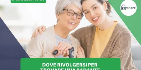 Anziani sorridenti, una giovane donna abbraccia un'anziana con bastone. Guida su come trovare una badante.