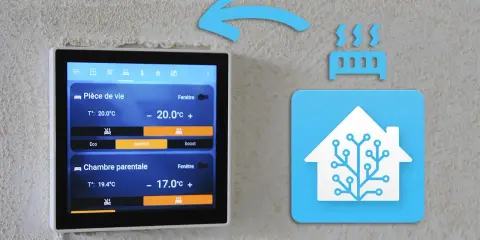 Écran tactile de domotique affichant la température de deux pièces. Apprenez comment programmer un programmateur pour optimiser votre confort.