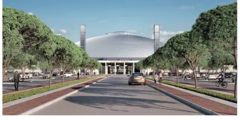 Ingresso ovest della fiera di Rimini, con viali alberati, parcheggi e un'imponente cupola.