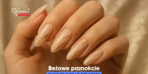 Eleganckie paznokcie nudę ze zlotem, zdobione subtelnymi, złotymi liniami. Idealne na każdą okazję.