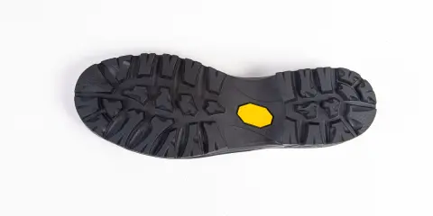 Podeszwa Vibram do butów trekkingowych, gotowa do wymiany, zapewniająca przyczepność i trwałość.