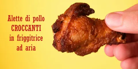 Alette di pollo croccanti in friggitrice ad aria, dorate e pronte da gustare.