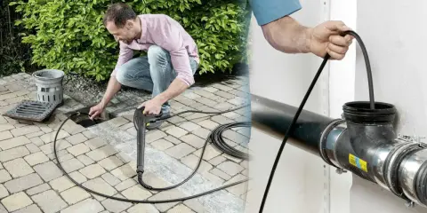 Mężczyzna używa myjki ciśnieniowej do czyszczenia rury kanalizacyjnej.