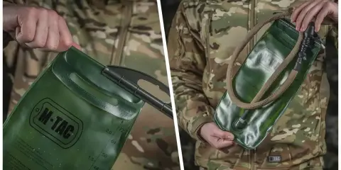 Zielony bukłak na wodę M-TAC z rurką, gotowy do akcji. Idealny na wyprawy, by mieć wodę zawsze pod ręką.