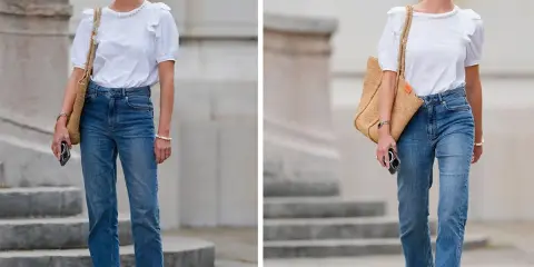 Donna con outfit jeans e maglietta bianca, borsa di paglia e occhiali da sole.