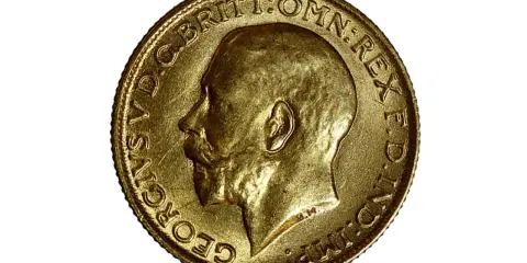 Moneta d'oro 917, che corrisponde a 22 carati, con il profilo di Re Giorgio V.