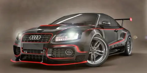 Audi negro con detalles rojos, un coche deportivo de alta gama. ¿Audi de donde es? De Alemania, ¡pura ingeniería!