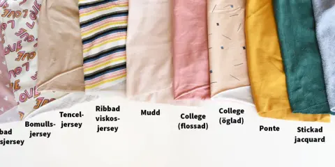 Olika tyger i rullar, från hjärtmönstrat bomullsjersey till stickad jacquard och bomulls-fleece. Vissa har fina stygn i kant.
