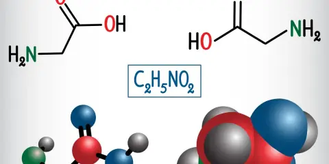 Struktura chemiczna glicyny, najprostszej aminokwasu. Wzór sumaryczny C₂H₅NO₂.