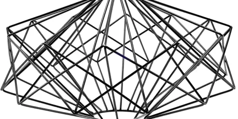 Geometryczny abażur druciany w kształcie diamentu. Nowoczesna, ażurowa konstrukcja z czarnego metalu.