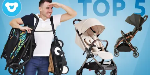 Mężczyzna prezentuje kilka modeli wózków spacerowych, w tym jeden z motywem dżungli. Szuka idealnego, taniego wózka spacerowego.