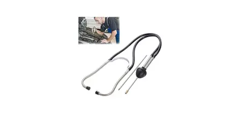 Un mecánico usa un estetoscopio mecánico para diagnosticar ruidos en un motor.