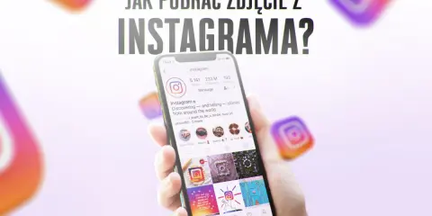 Ręka trzyma smartfon z profilem Instagrama. Tekst "Jak pobrać zdjęcie z Instagrama?" sugeruje poradnik.