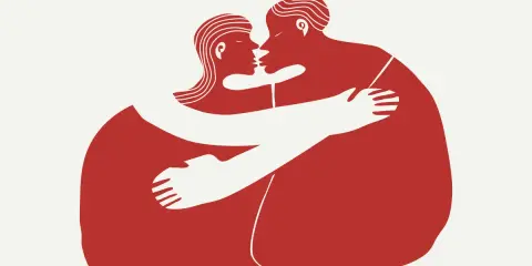 Dwie osoby obejmują się czule. To piękny przykład, co daje przytulanie – poczucie bliskości i bezpieczeństwa.