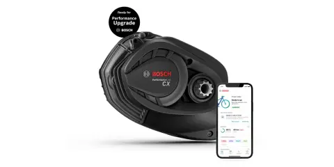 Silnik Bosch Performance CX Gen 5 do e-bike'a, gotowy na aktualizację. Obok smartfon z aplikacją Bosch eBike Flow.