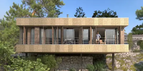 Casa moderna con fachada texturizada y grandes ventanales. Un hombre en el balcón. ¿Cuánto cuesta hacerse una casa teniendo el terreno?